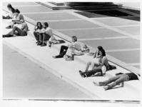 <span itemprop="name">Unidentified students relaxing by the main...</span>