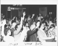 <span itemprop="name">Unidentified people raising their hands during a...</span>