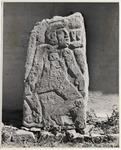 <span itemprop="name">Figure on upright stone slab....</span>
