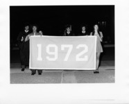 <span itemprop="name">Students holding a banner in a procession for...</span>