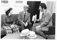 <span itemprop="name">An unidentified man and woman wearing hats, and...</span>