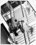 <span itemprop="name">Unidentified students on the stairs between the...</span>