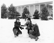 <span itemprop="name">A picture of three unidentified students making a...</span>