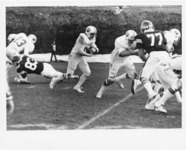 <span itemprop="name">A picture of a football game in play between the...</span>
