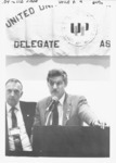 <span itemprop="name">Tim Reilly at a podium speaking at the Fall 1988...</span>