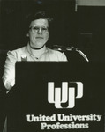 <span itemprop="name">Jeanne Galbraith speaking from a podium during an...</span>
