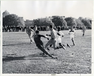 <span itemprop="name">Page 147 B-Bottom: Action shot of the men's soccer team.</span>