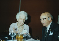 <span itemprop="name">Eugene P. Link and his wife Beulah looking at an...</span>