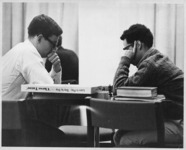 <span itemprop="name">Two unidentified students playing chess at the...</span>