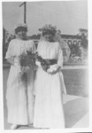 <span itemprop="name">A picture of two unidentified women who are in...</span>