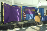 <span itemprop="name">An empty stage at the University at Albany's press...</span>