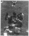 <span itemprop="name">Unidentified students reading and talking on the...</span>