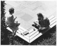 <span itemprop="name">Two unidentified people, possibly students,...</span>