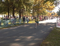 <span itemprop="name">A lone runner prepares to cross the finish line in...</span>