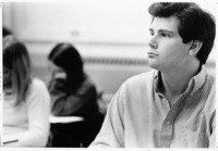 <span itemprop="name">An unidentified student listening to lecture in...</span>