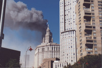 <span itemprop="name">A distant photo of the World Trade Center towers...</span>